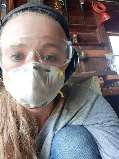 Wearing protective gear while sanding